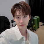 俳優イ・ジョンソク、ほっこりする日常を公開…祖父と手をつなぎ海辺を散歩